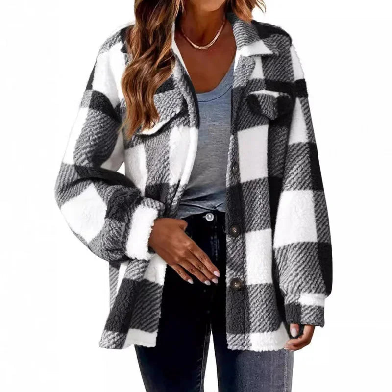 Warm women's oversized fleece plaid shacket, button-up, soft lining for extra comfort.