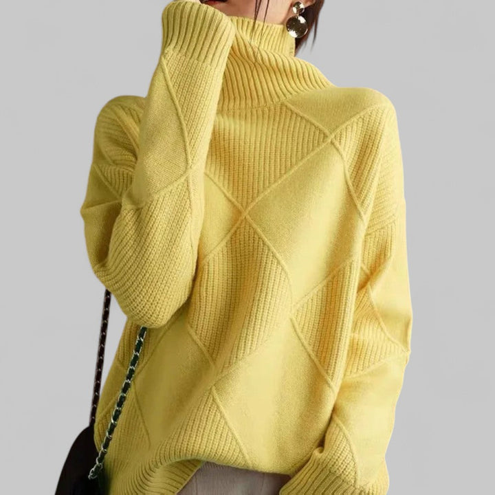 Comfortable women's oversized patterned turtleneck sweater, offering warmth and style for winter.