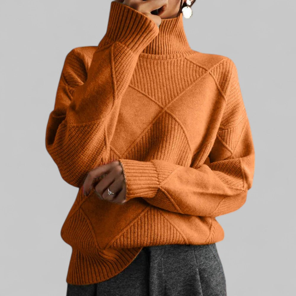 Trendy women's oversized turtleneck sweater showcasing an attractive pattern, great for layering.