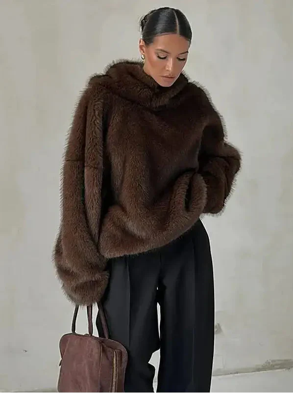 Women's oversized plush hoodie pullover, perfect for winter warmth & cozy comfort. Stylish loungewear with drop shoulder.