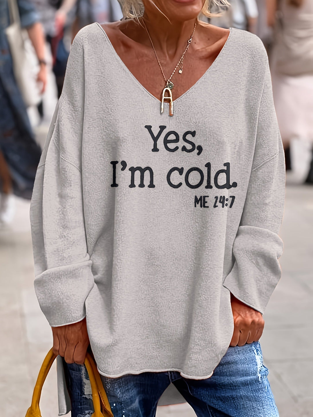 Stylish women's Alenia oversized V-neck sweater with unique pattern, ideal for a cozy casual look.