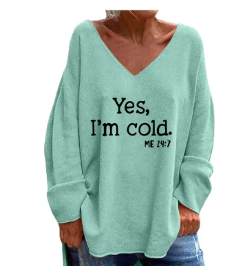 Women's oversized V-neck patterned sweater, combining comfort, style, and a cozy feel for fall.