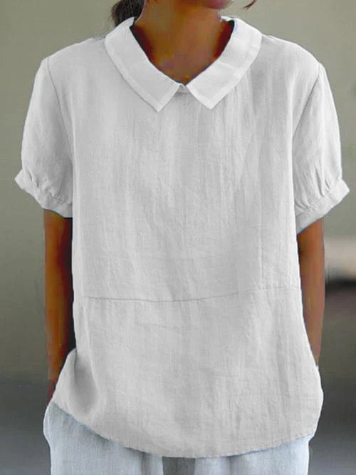 Comfortable women's relaxed fit blouse with classic Peter Pan collar, ideal for casual and everyday fashion.