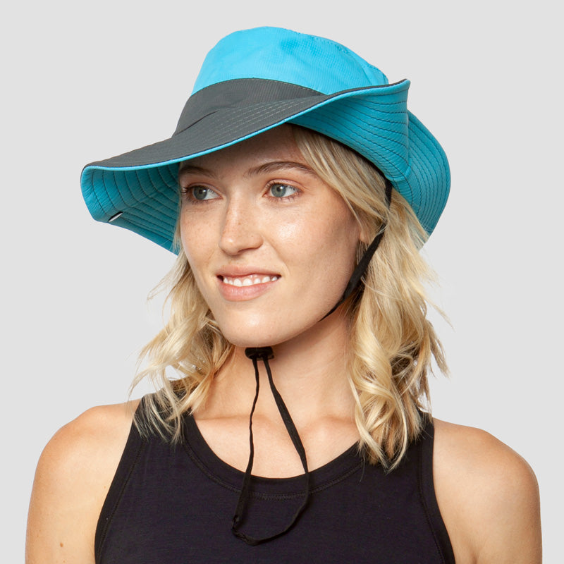 Women's grey UV protection sun hat, foldable for hiking, with a secure drawstring