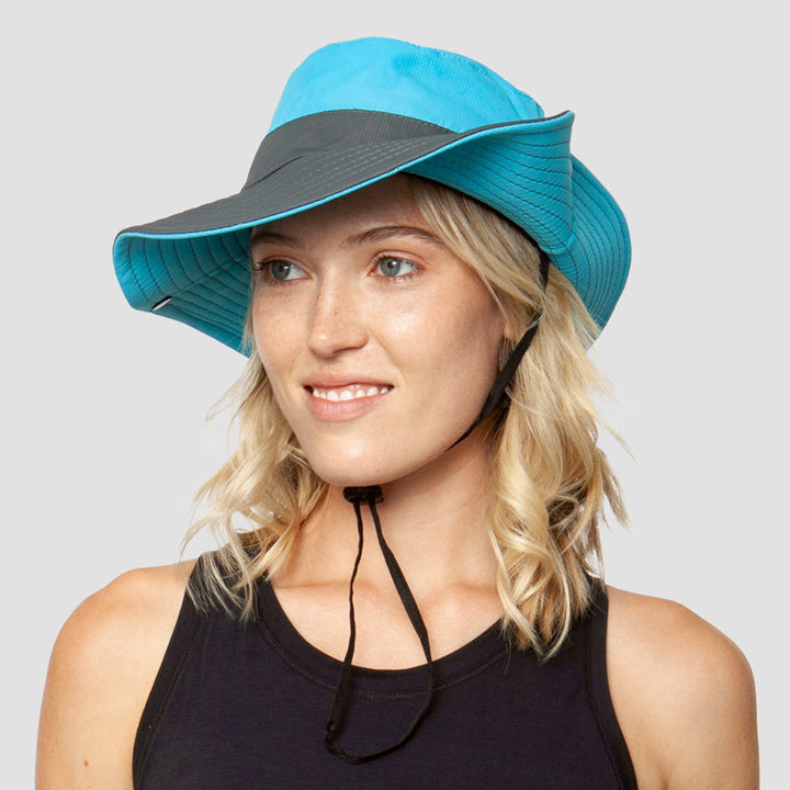 Women's grey UV protection sun hat, foldable for hiking, with a secure drawstring