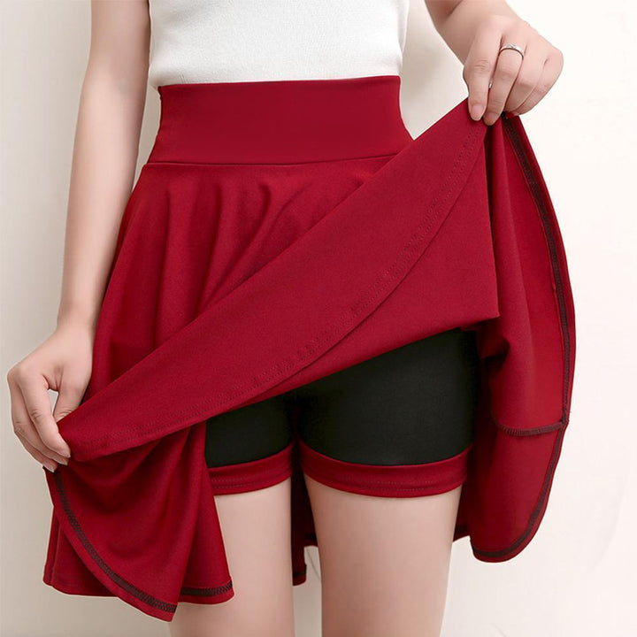 Women's comfortable A-line skort with pleats and elastic waist, side view