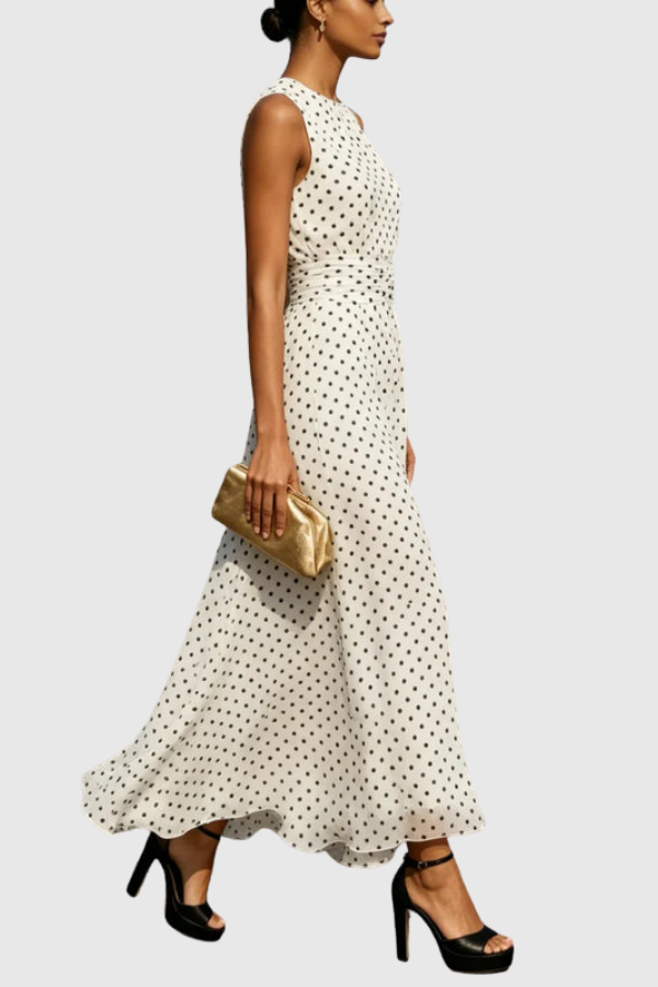 Effortless summer style: women's A-line polka dot maxi dress, sleeveless, great for vacation, beach, or casual wear.