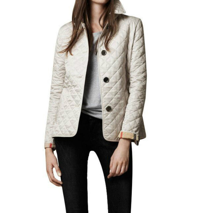 Classic women's quilted transitional jacket 'Armina', featuring a timeless button closure. Ideal for cool weather.