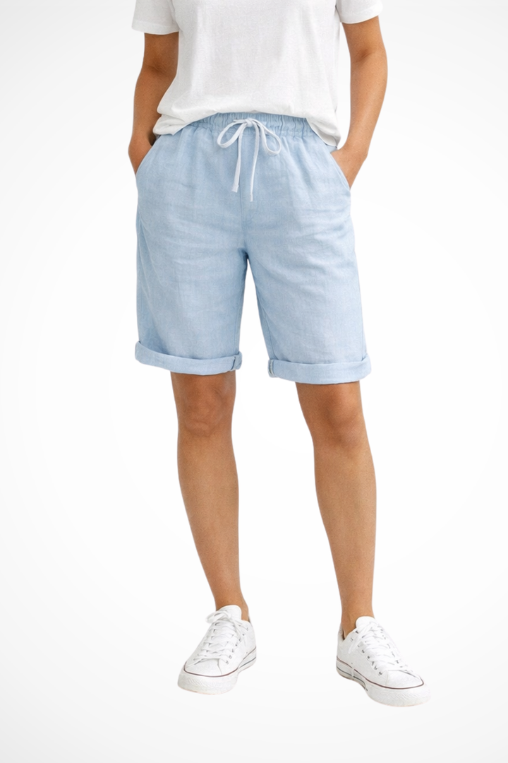 Comfortable women's capri shorts with a relaxed fit & drawstring waist, perfect for travel & warm weather.