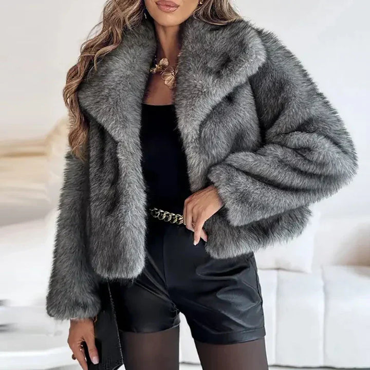 Close-up of the luxurious faux fur texture on a women's relax fit winter jacket, very cozy