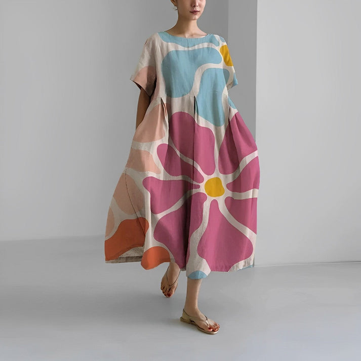 Elegant women's floral print midi dress, relaxed fit, ideal for spring fashion and comfort.