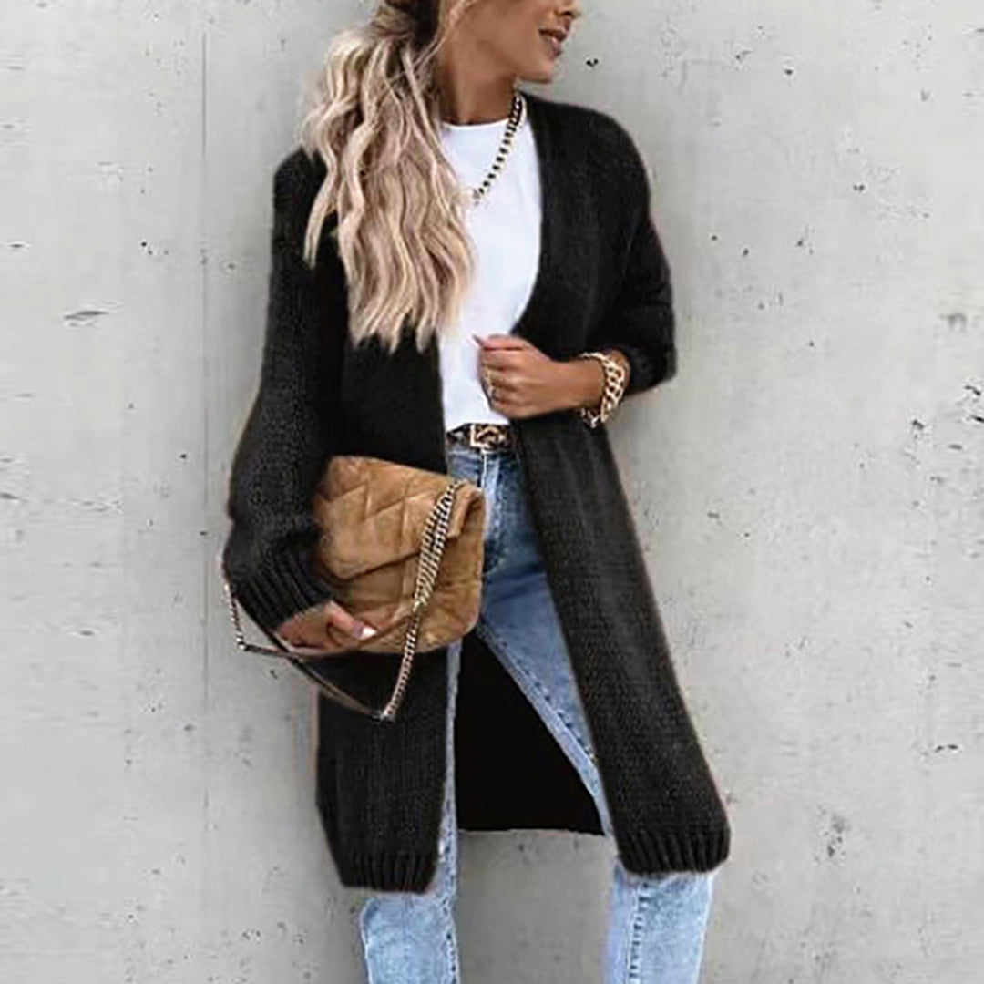 Elegant women's black cardigan, long open front style with a relaxed, comfortable fit