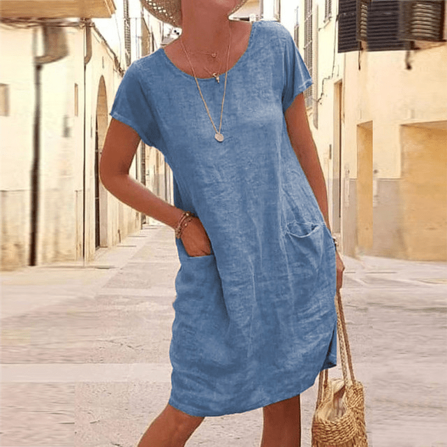 Stylish women's relaxed fit mini dress, short sleeve & round neck. Versatile casual sundress with pockets.