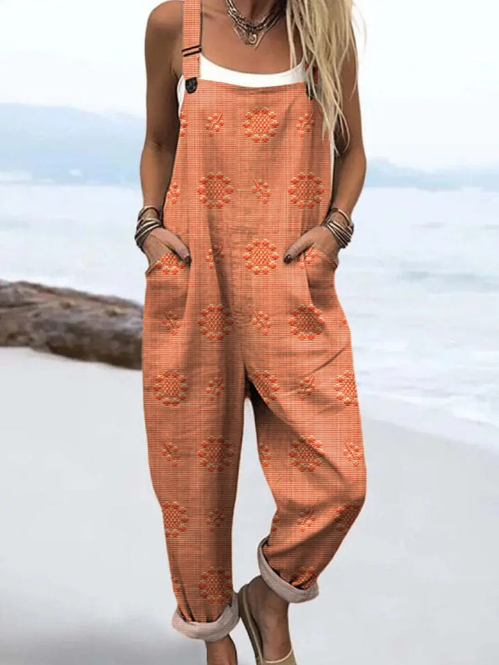 Modern women's patterned relaxed-fit jumpsuit. Wide-leg design offers ultimate comfort and effortless style.