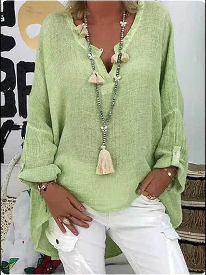 Elegant women's long sleeve V-neck blouse, relaxed fit, perfect for stylish everyday or work outfits.