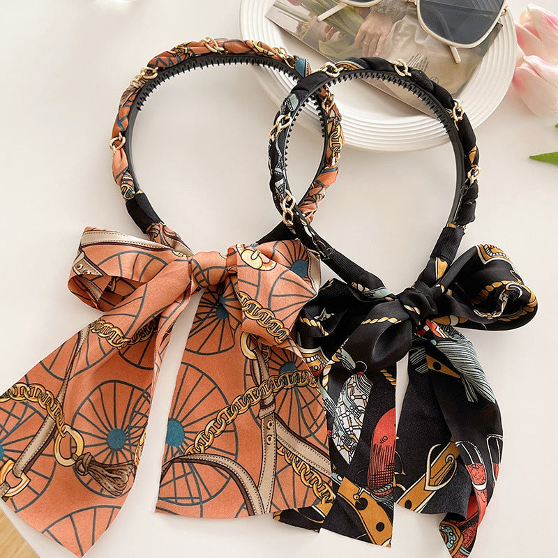Elevate your hairstyle with this retro ribbon hairband, a must-have for easy braiding for women.