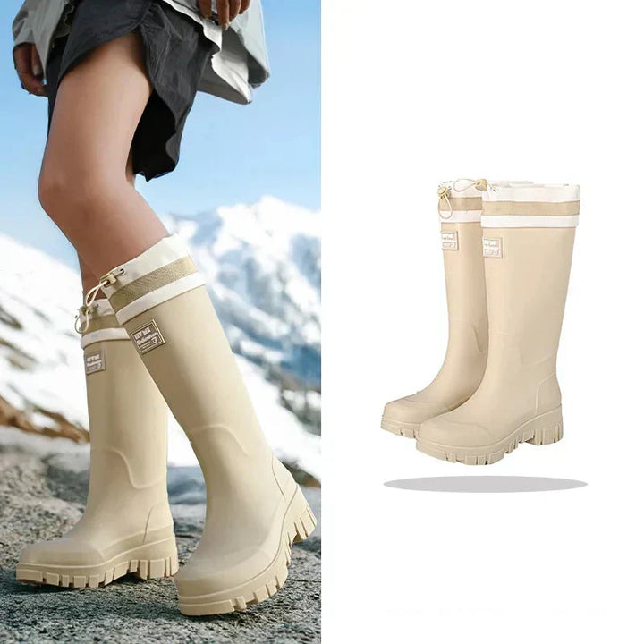 Elegant women's retro rain boots, waterproof and anti-slip. Essential ladies footwear for autumn's wet weather.