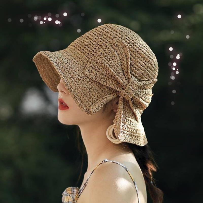 Stylish women's summer hat: wide brim, large bow, perfect for beach and sun protection