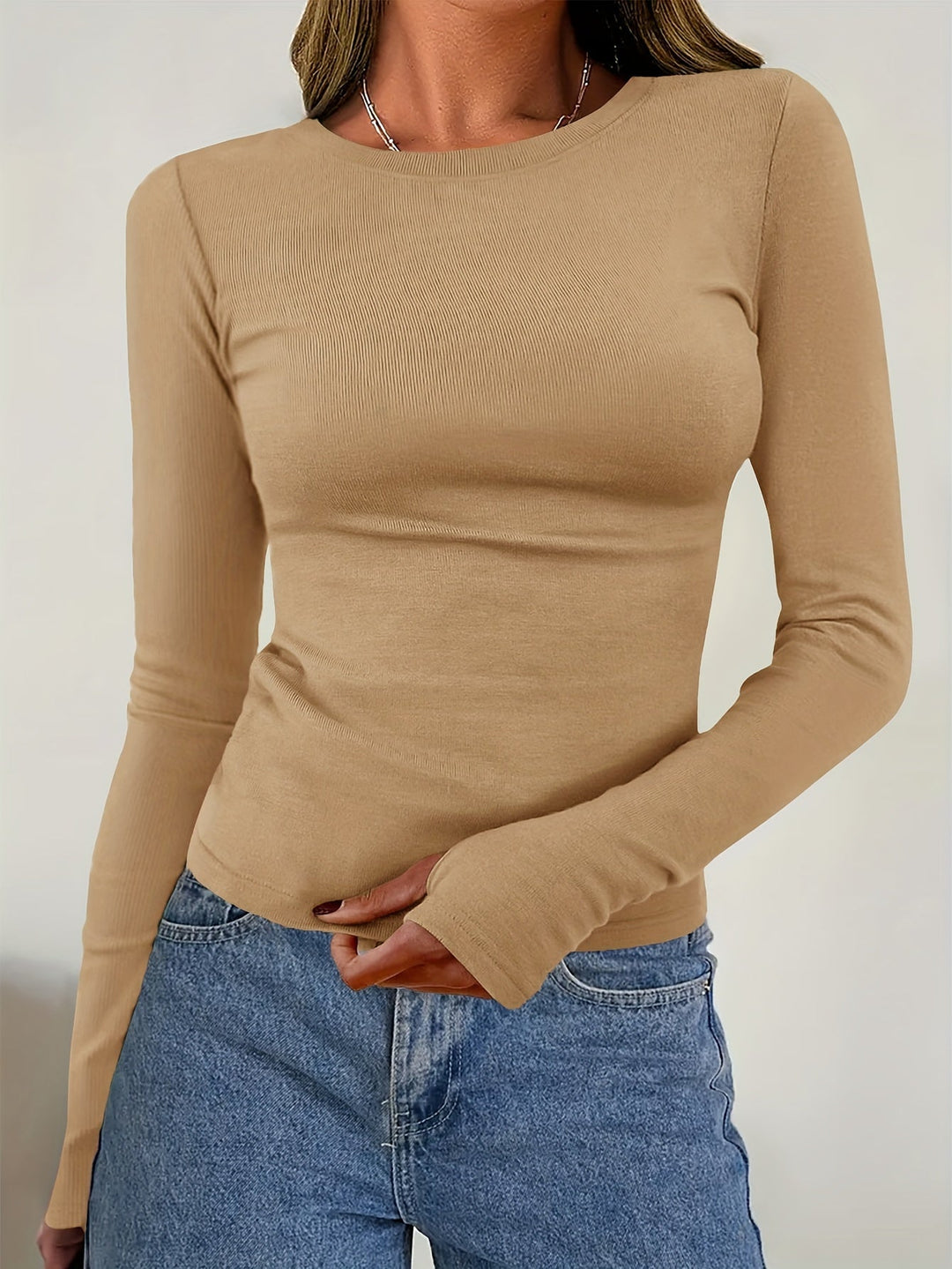 Stylish women's round neck long sleeve top for easy autumn & winter layering.