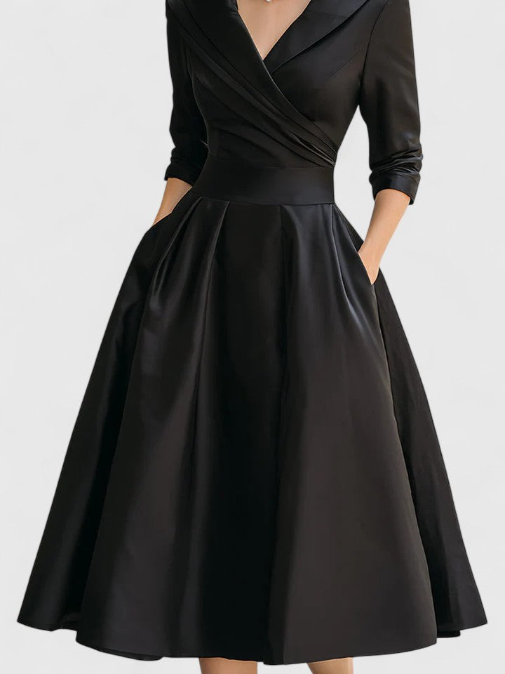 Beautiful women's A-line midi dress with ruched details, a sophisticated wrap collar & 3/4 sleeves.