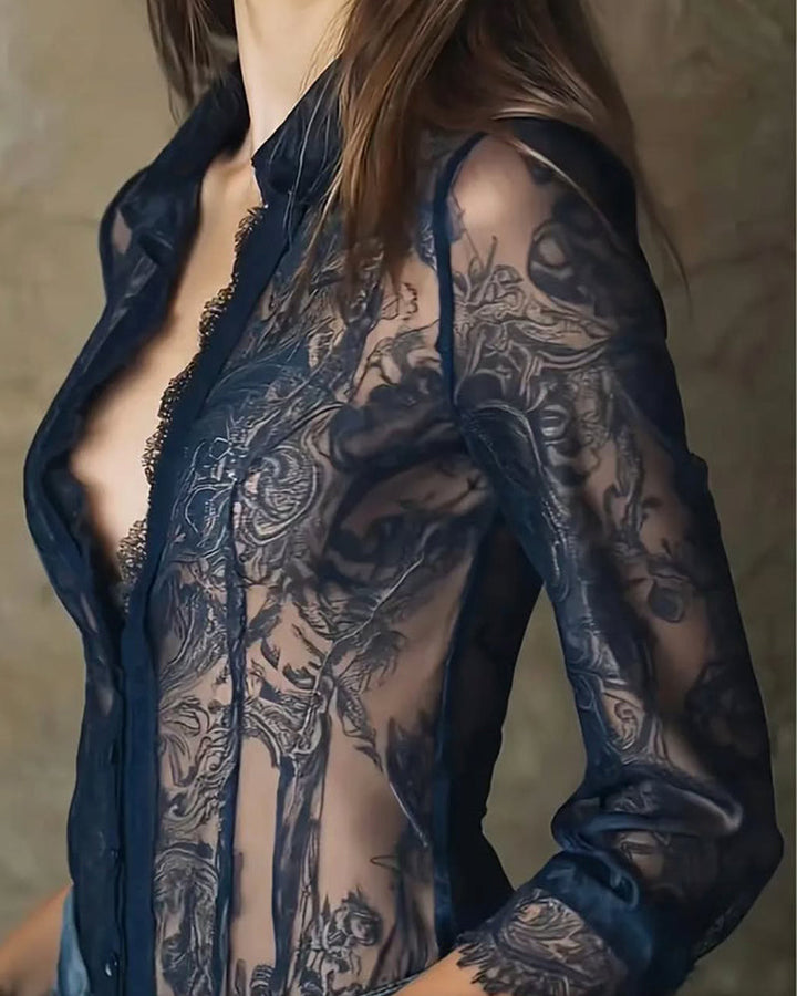Stylish women's sheer button-down top with intricate lace trim, versatile for casual chic or sophisticated wear.