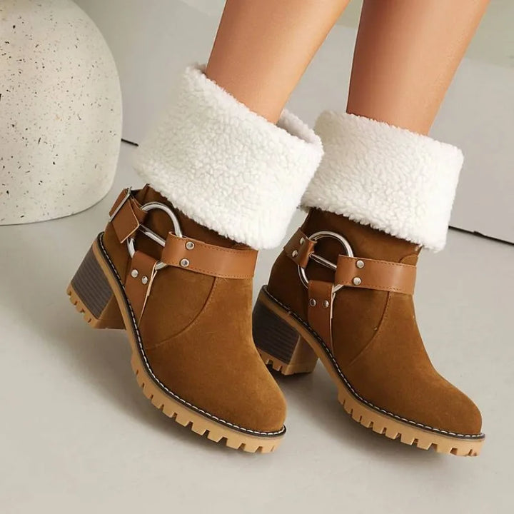 Back view of women's ankle boots, emphasizing block heel and structured design