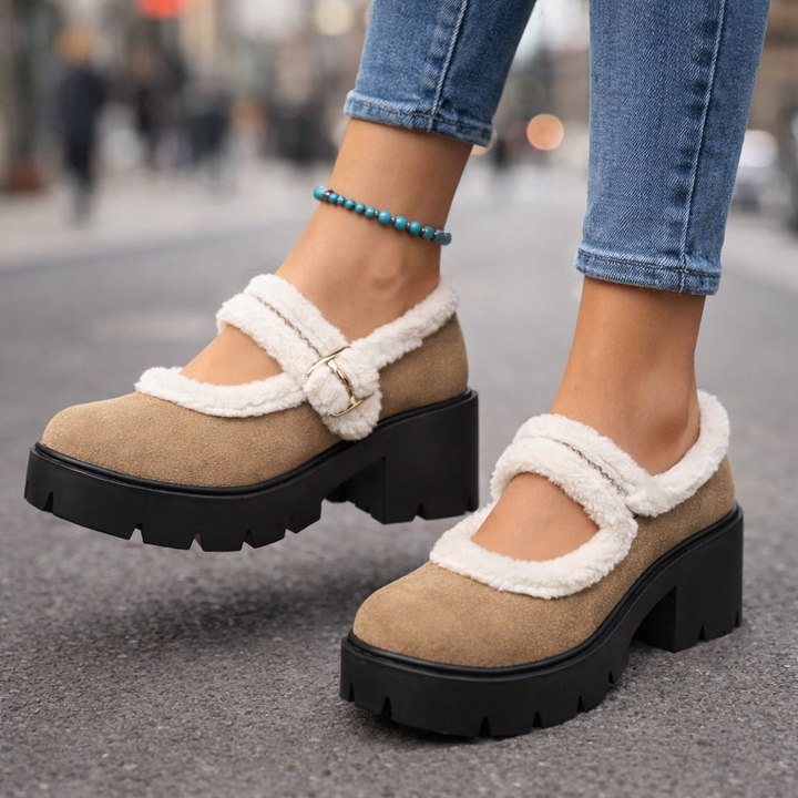 Close-up of a Women's Sherpa Platform Boot showing fluffy sherpa lining & high-quality tan suede texture.