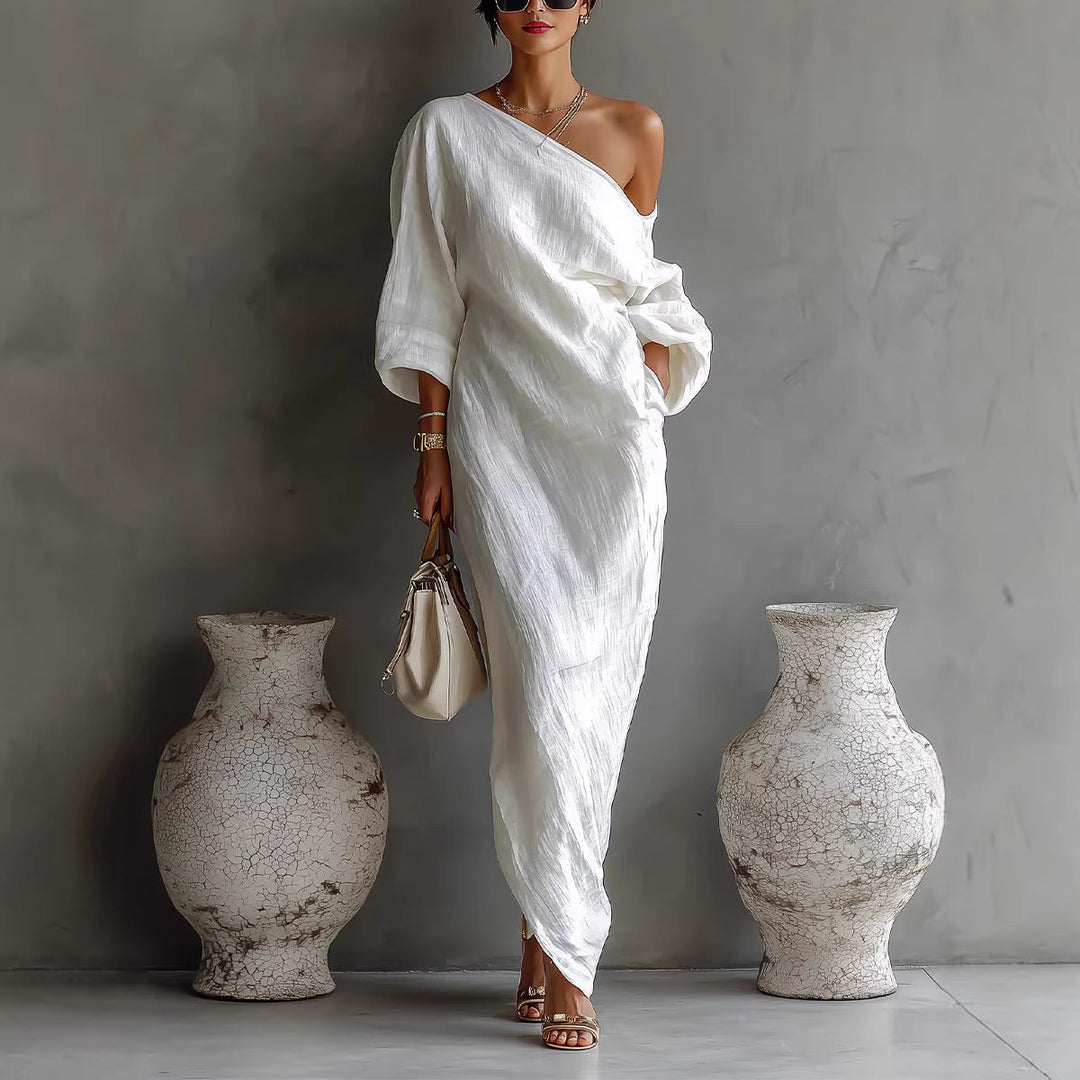 Elegant women's flowy maxi dress with slanted neck & lantern sleeves. Ideal for day to night comfort.