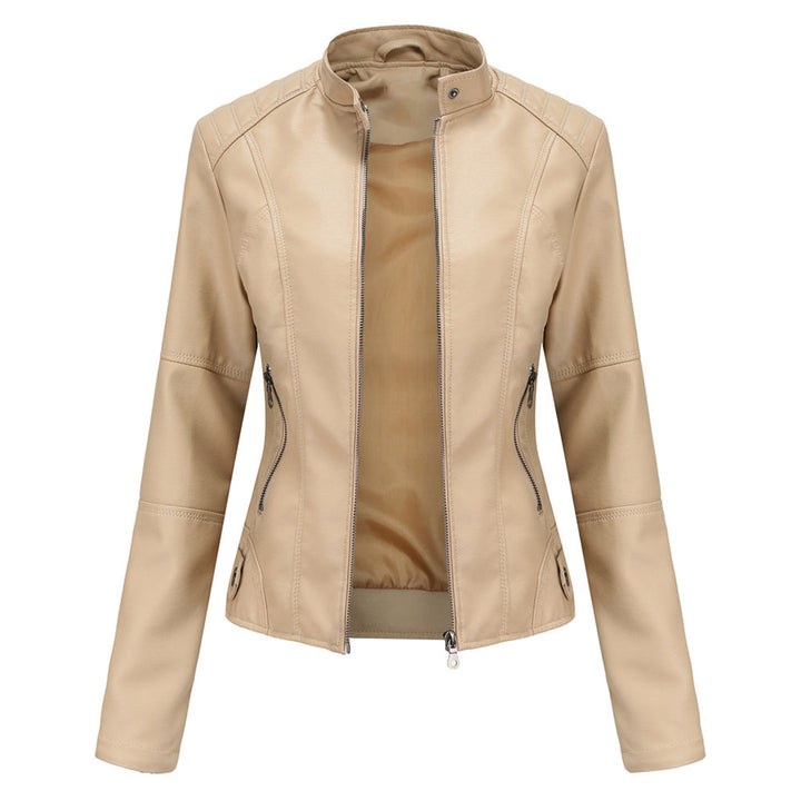Close-up of the collar and zipper on a women's black faux leather slim-fit biker jacket