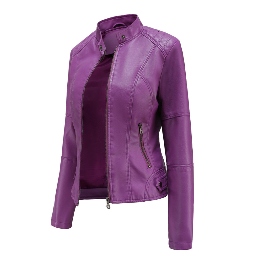 Detail of the sleeve and cuff of a women's black slim-fit faux leather biker jacket