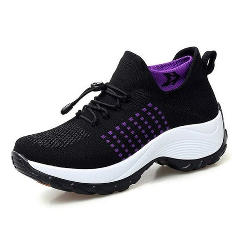 Lightweight women's comfort walking sneakers. Slip-on design for easy wear, perfect for everyday activities.