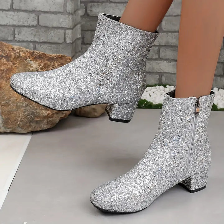 Elegant women's glitter heeled ankle boots, a sparkling statement shoe for parties & special occasions.