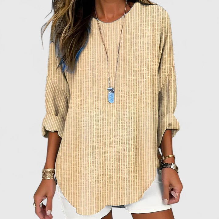 Women's striped crew neck blouse for effortless everyday style. Versatile casual shirt for work or weekend comfort.