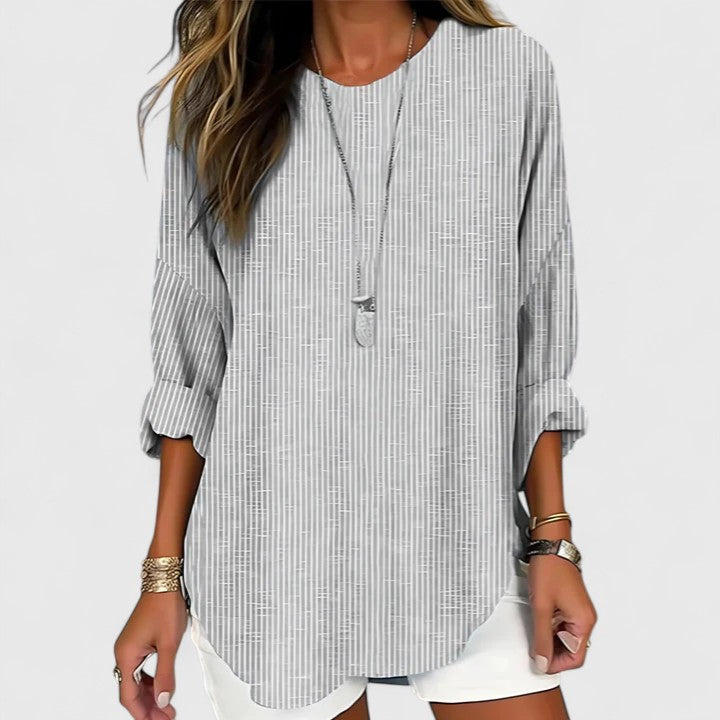 Casual women's striped top offering everyday comfort & style. Effortless crew neck blouse, a versatile ladies apparel.