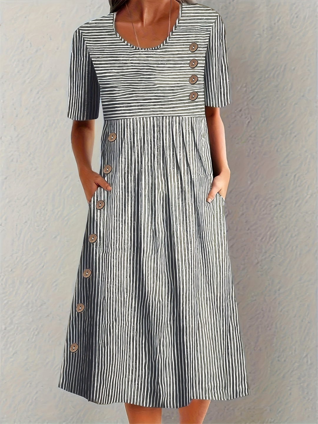 Chic women's striped midi dress with elegant button detailing. Versatile for summer fashion, everyday, or work.