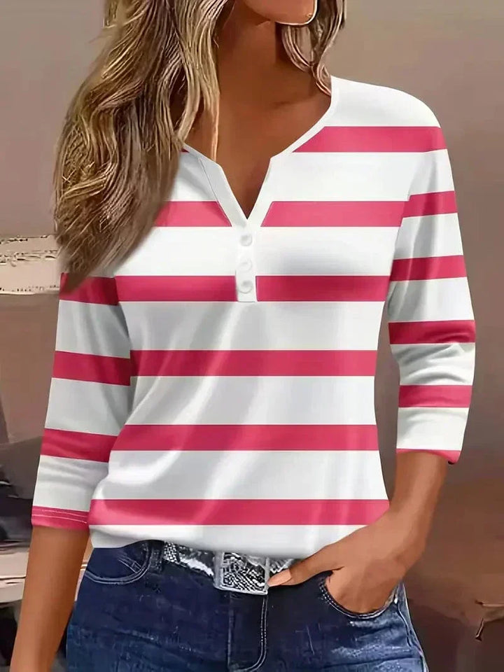 Elegant women's striped V-neck 3/4 sleeve blouse. Comfortable & stylish top for everyday casual wear.