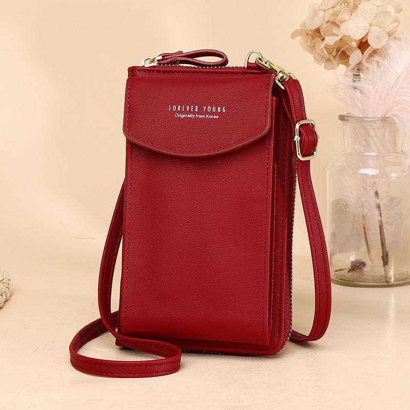 Side profile of the women's crossbody wallet, highlighting its slim and elegant silhouette