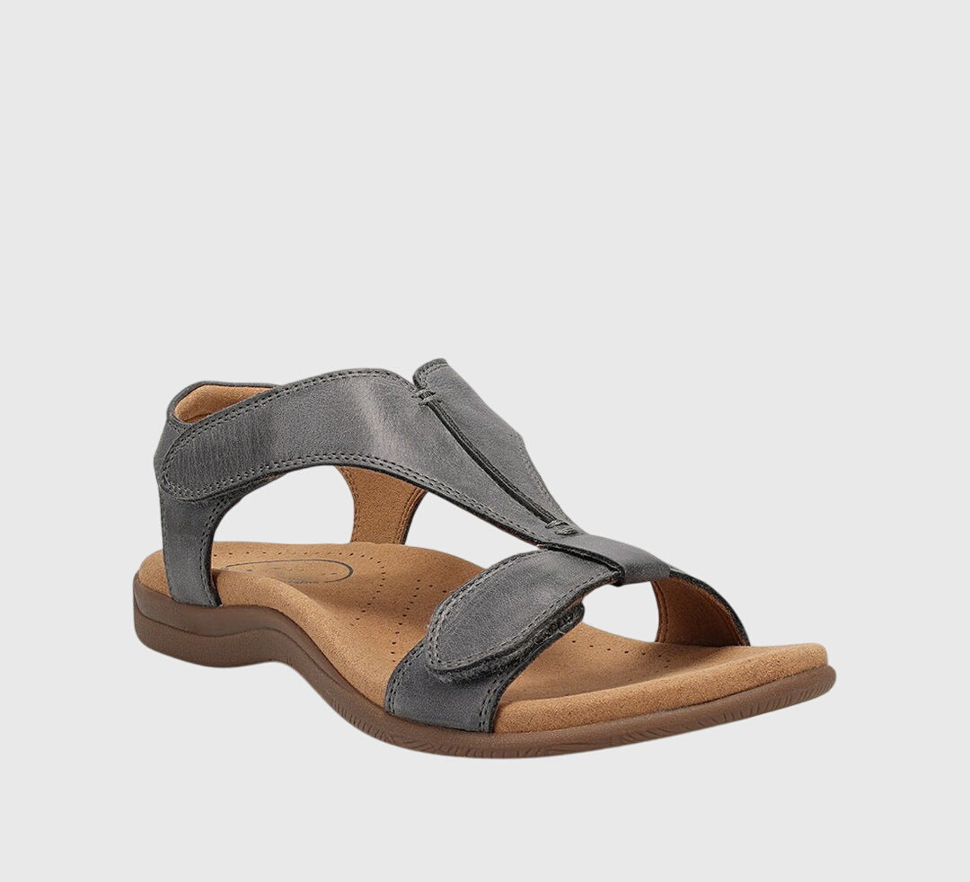 Comfortable women's T-Bar walking sandals, flat with adjustable straps for everyday wear.