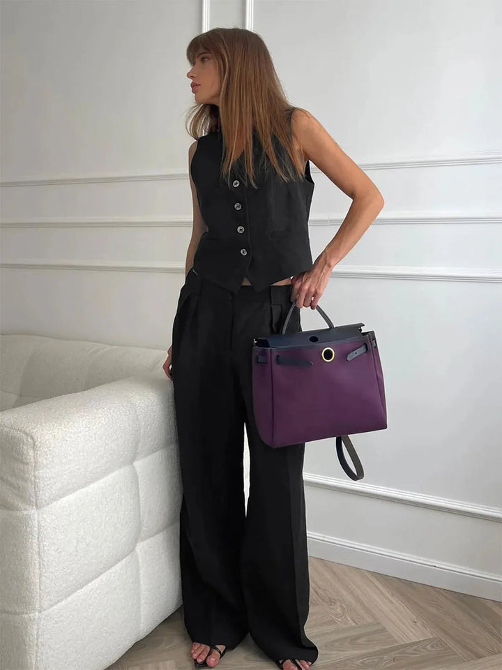 Smart casual women's tailored set with a waistcoat and wide-leg trousers, perfect for sophisticated summer fashion.