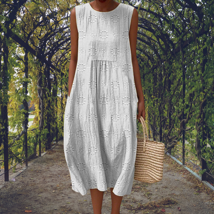 Comfortable textured sleeveless midi dress for women, versatile for casual or vacation.