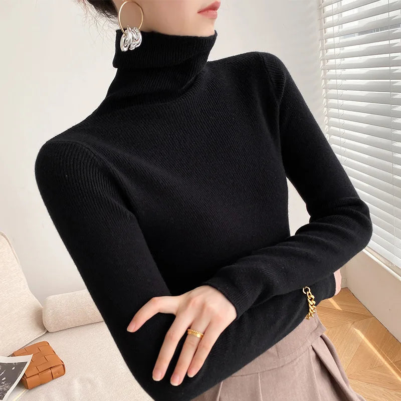 Women's elegant cashmere turtleneck sweater, incredibly soft, warm, and perfect for versatile layering.