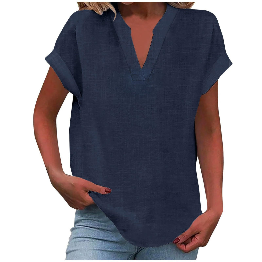 Ladies' relaxed fit V-neck blouse with smooth drape. A stylish & versatile piece for spring.