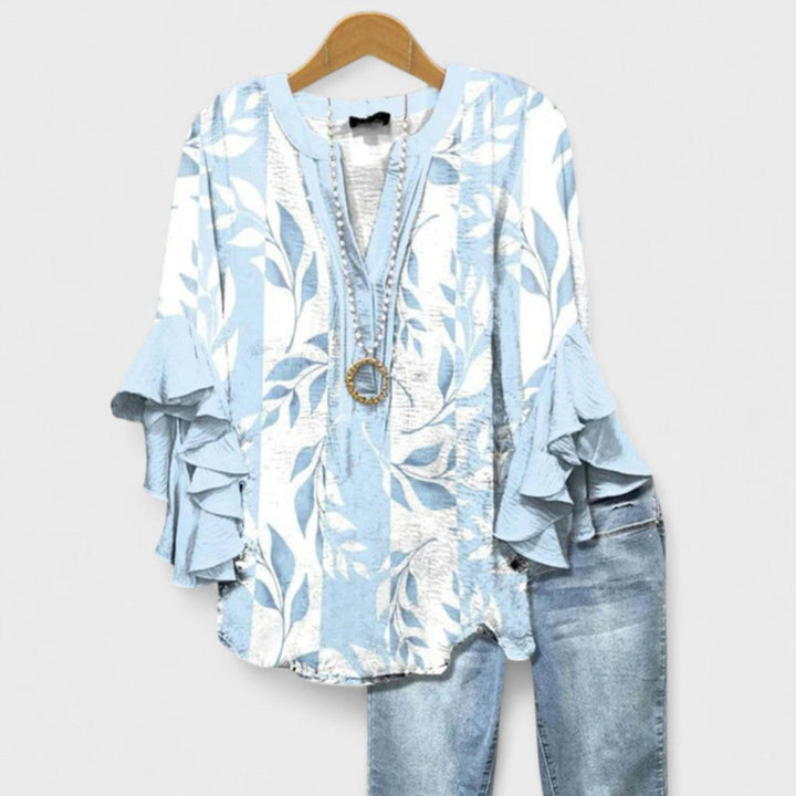 Elegant women's V-neck top with ruffle sleeves, versatile for office or casual style.