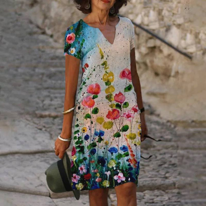 Full shot of a women's v-neck floral print midi dress, suitable for day wear, stylish and versatile