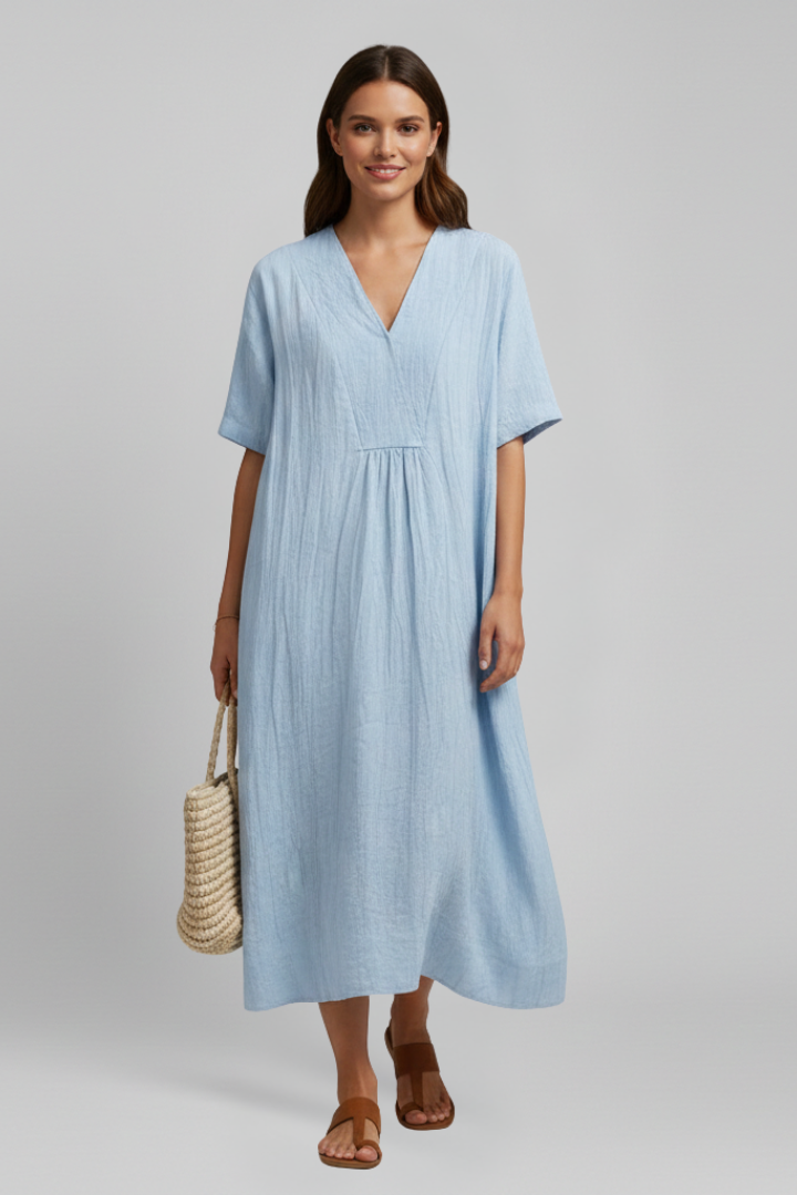 Stylish women's flared dress, V-neck, short sleeve, with a unique spot pattern design.