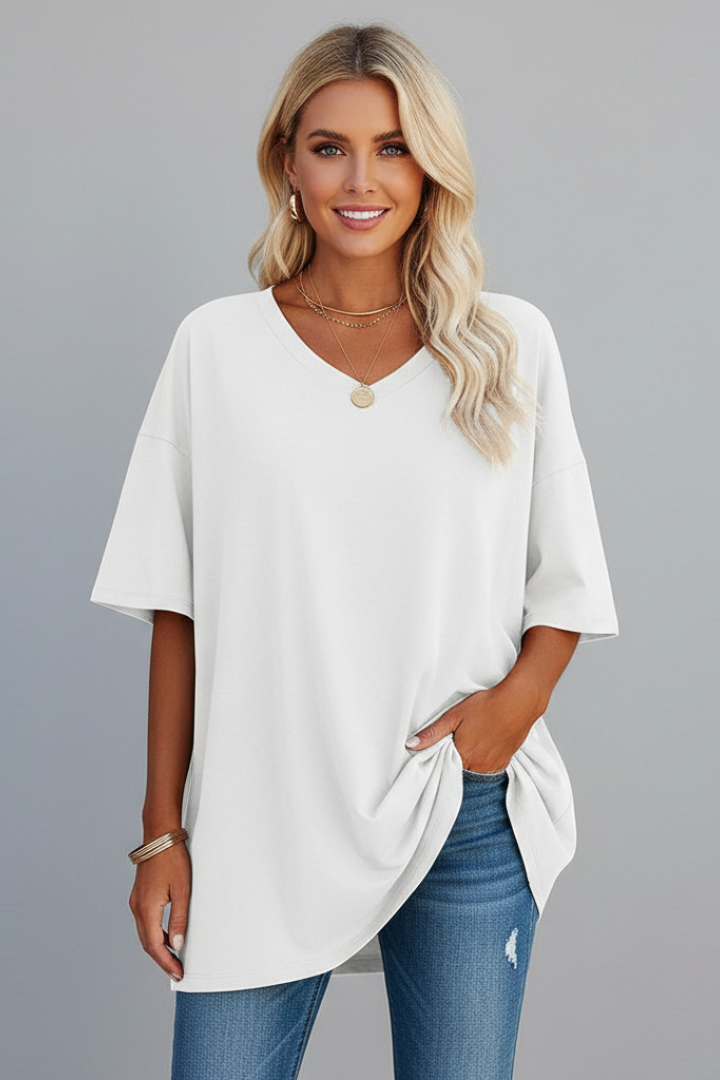 Back view of women's comfortable loose fit V-neck t-shirt, short sleeves for relaxed style.