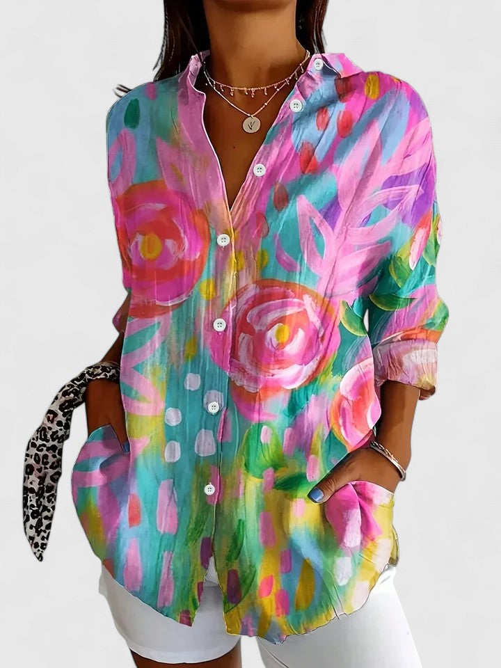Women's versatile printed blouse, perfect for casual or elegant wear. Features a vibrant, colorful pattern.