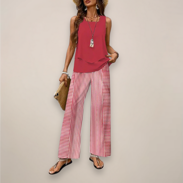 Full shot of a model wearing a comfortable women's printed wide-leg two-piece set, ideal for casual outings.