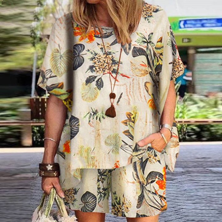 Full shot of a model wearing a women's khaki linen suit with a retro print, ideal for summer