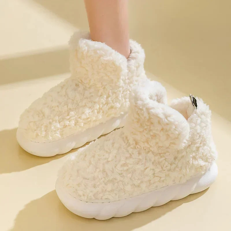 Comfortable women's warm slippers. Stylish indoor/outdoor footwear with soft plush for cold weather home wear.